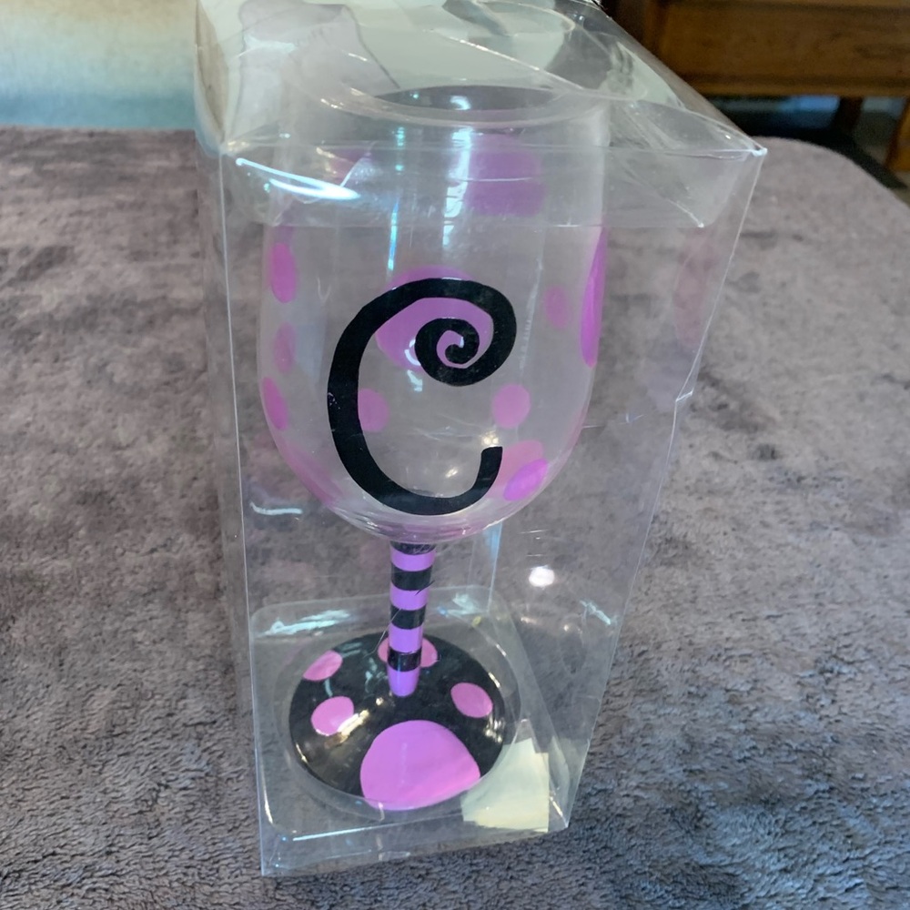 New- Never used- Wine glass- with “C” on it. Purple polka dots-